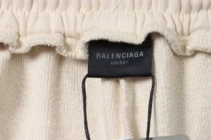 Balenciaga-Distressed-Shorts-With-Button-Down-Embroidery-10.webp
