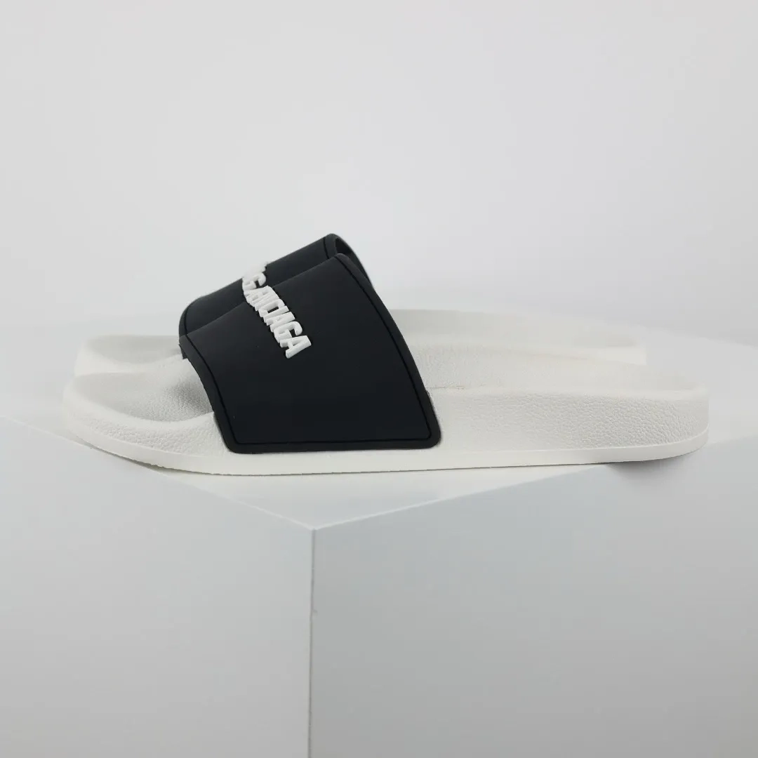Balenciaga-Flip-Flops-with-logo-Print-white-and-black-2.webp