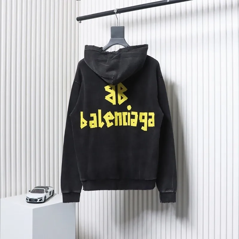 Balenciaga-Hoodie-With-Distressed-Vandal-Tape-Lettering-1.webp
