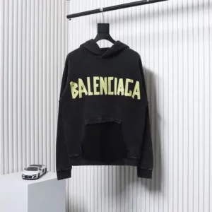Balenciaga-Hoodie-With-Distressed-Vandal-Tape-Lettering.webp