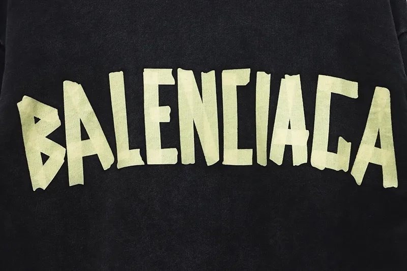 Balenciaga-Hoodie-With-Distressed-Vandal-Tape-Lettering-4.webp