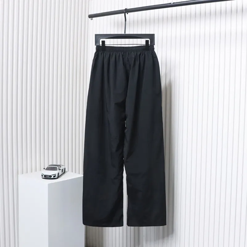 Balenciaga-Jogging-Pants-With-Blurred-Letter-Print-1.webp