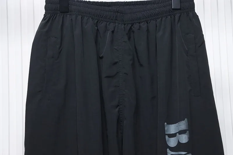 Balenciaga-Jogging-Pants-With-Blurred-Letter-Print-2.webp