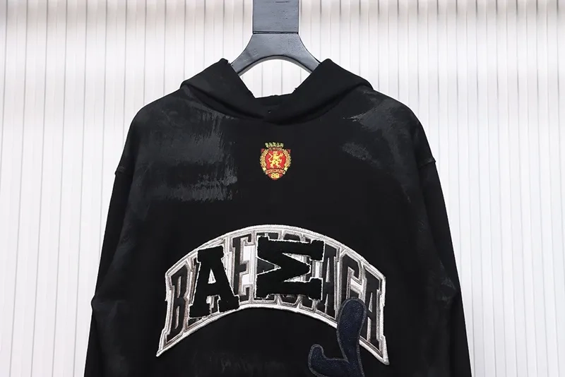 Balenciaga-Manchester-United-Distressed-Embroidered-Hoodie-2.webp