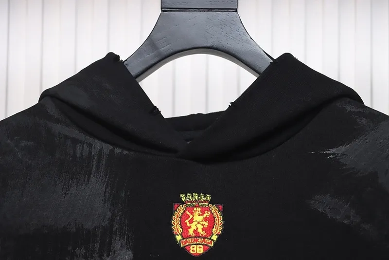 Balenciaga-Manchester-United-Distressed-Embroidered-Hoodie-3.webp