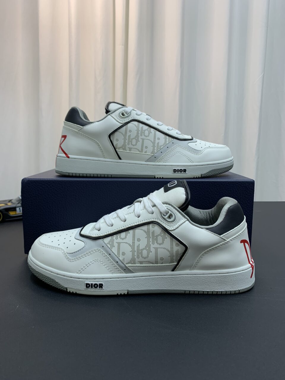 DIOR B27 Low Top Sneakers | White Leather Red logo