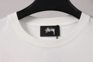 Stussy-Doll-Slogan-Print-T-Shirt-6.webp