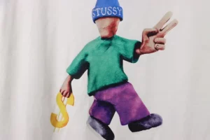 Stussy-Doll-Slogan-Print-T-Shirt-7.webp
