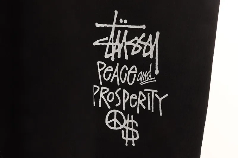 Stussy-Peace-Prosperity-T-Shirt-10.webp