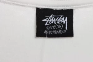 Stussy-Reflective-Character-Print-T-Shirt-11.webp