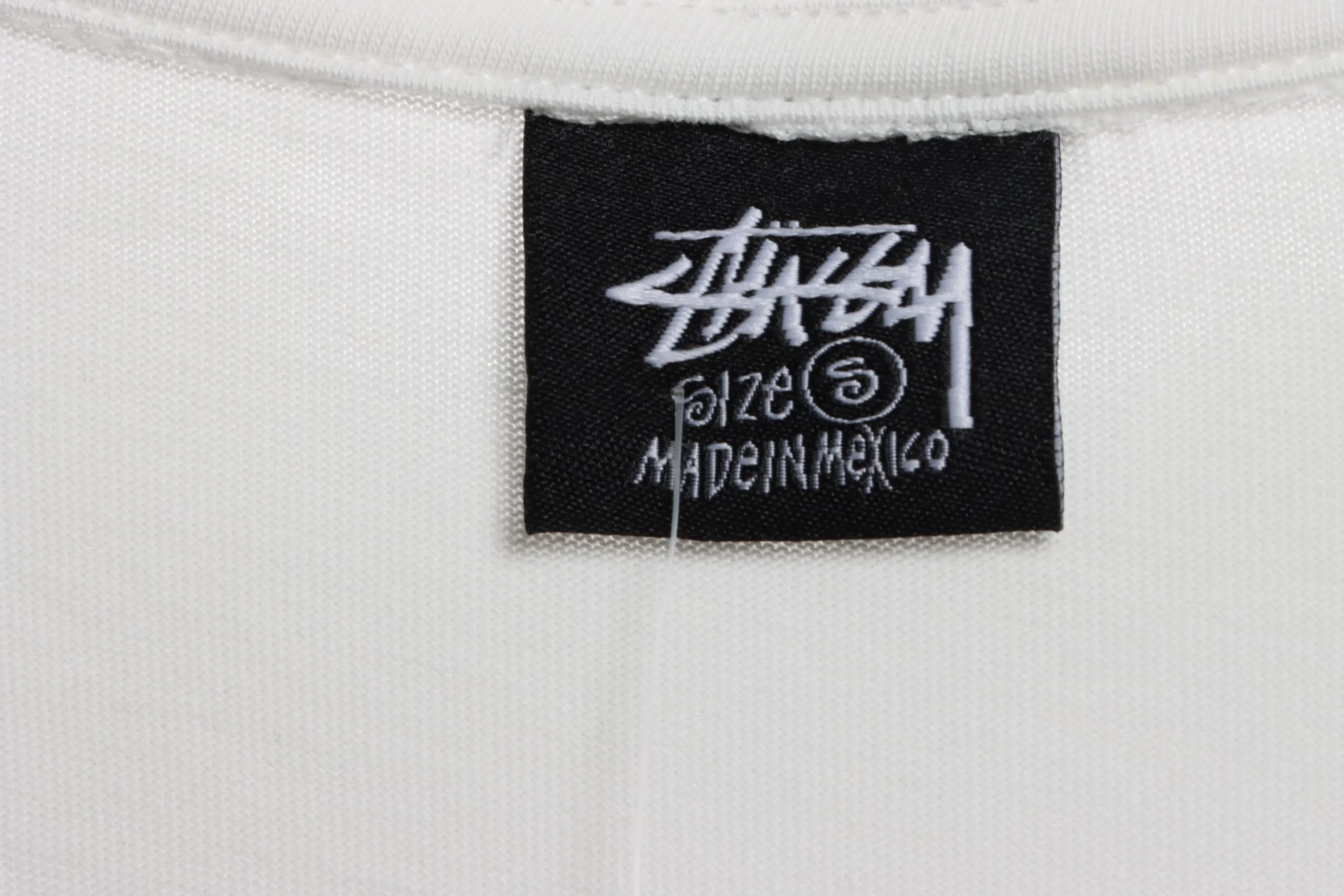 Stussy-Reflective-Character-Print-T-Shirt-11.webp