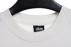 Stussy-Reflective-Character-Print-T-Shirt-6.webp