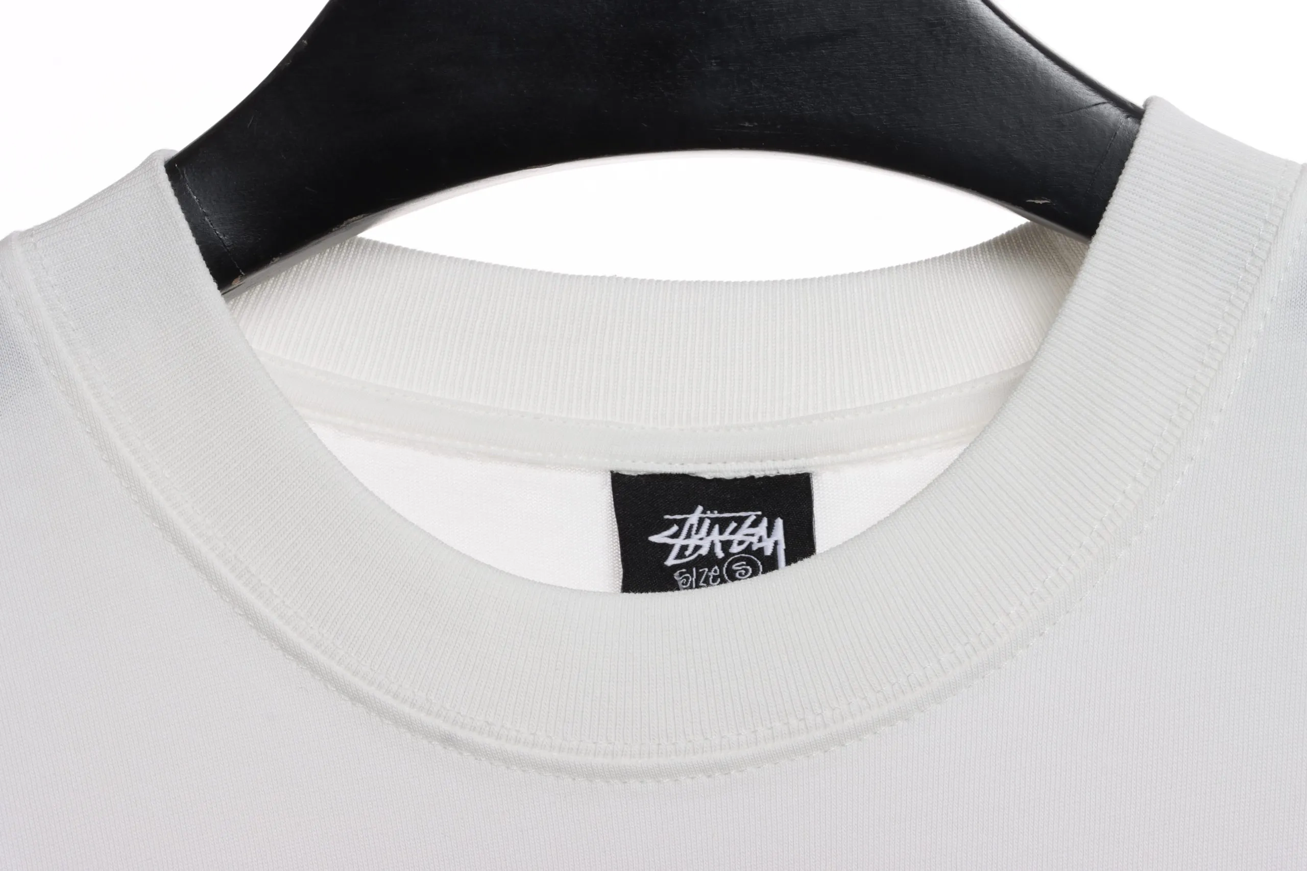 Stussy-Reflective-Character-Print-T-Shirt-6.webp