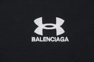 Balenciaga-x-UA-Reversible-Embroidered-Logo-Hooded-Jacket2.jpeg.webp