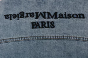 Maison-Margiela-Four-Stitch-Detail-Inverted-Lettering-Denim-Jacket6.jpeg.webp