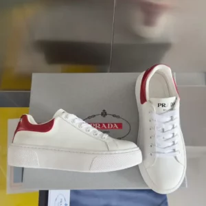 PRADA-MACRO-RE-NYLON-AND-BRUSHED-LEATHER-SNEAKERS-PRD062-1.webp