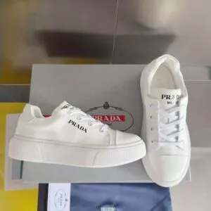 PRADA-MACRO-RE-NYLON-AND-BRUSHED-LEATHER-SNEAKERS-PRD064-1.jpg