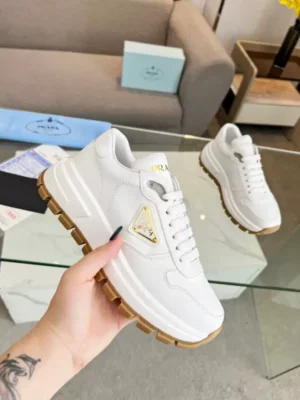 PRAX-01-DELAVE-SUEDE-AND-RE-NYLON-SNEAKERS-PRD049-1.webp